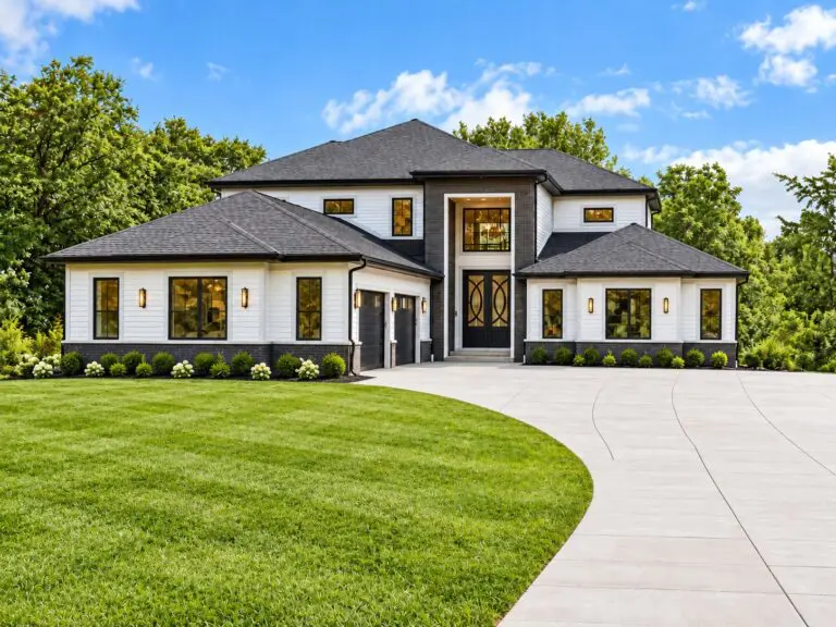 Apex custom home exterior in Sussex by Kingfogl Construction