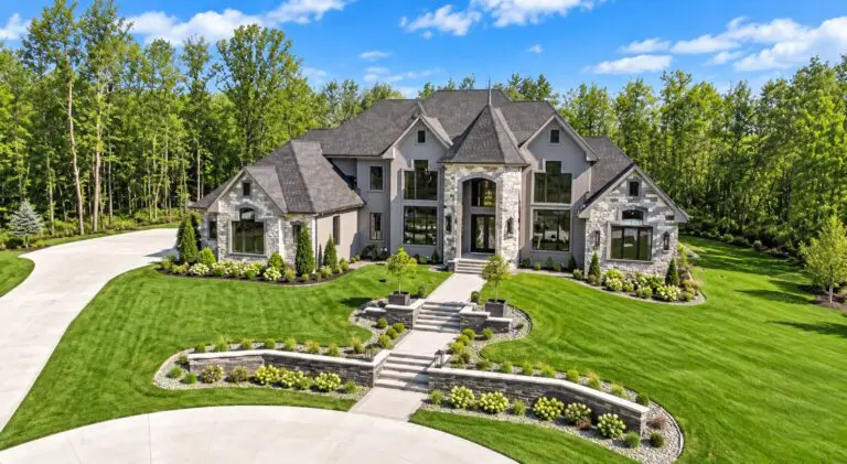 Woodland custom home in West Bend by Kingfogl – aerial view of the front elevation