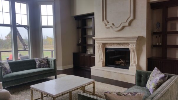 Presidio great room cast stone fireplace with built-ins