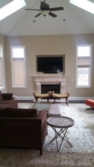 Presidio hearth room with fireplace and media wall