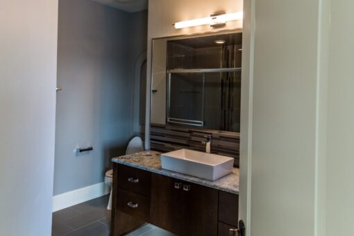 Presidio bathroom with vessel sink and glass shower