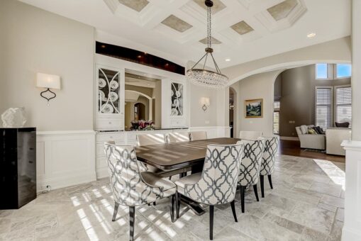 Wildwood dining room with chandelier and coffered ceiling