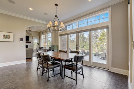 Wildwood breakfast area with French doors and chandelier