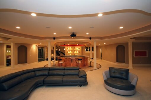 Haven lower-level lounge with sectional and bar