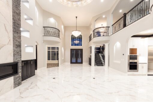Woodland foyer with balconies and arched windows