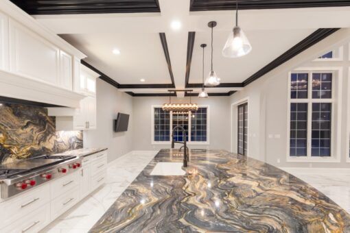 Woodland kitchen island with dramatic stone countertop