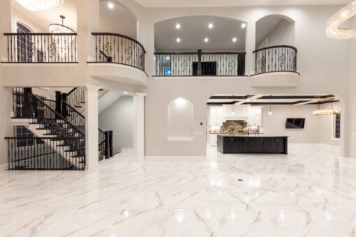 Woodland two-story foyer with curved balconies
