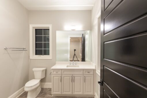 Woodland bathroom with white vanity and toilet