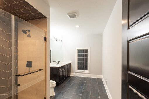 Woodland bathroom with black vanity