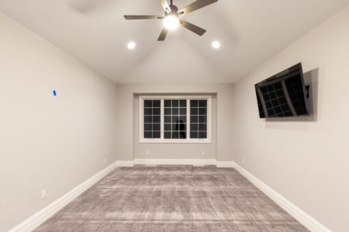 Woodland bedroom with vaulted ceiling