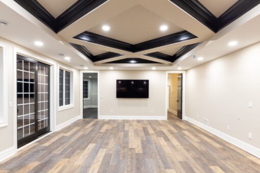 Woodland lower-level family room with media wall