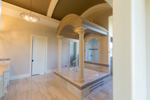 Callista primary bath with columns and soaking tub