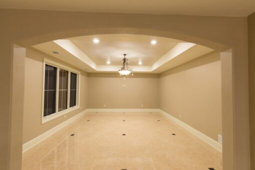 Callista lower-level room with tray ceiling