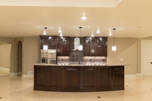 Callista lower-level kitchen with dark cabinetry