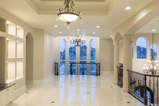 Callista loft overlooking the foyer with iron railing