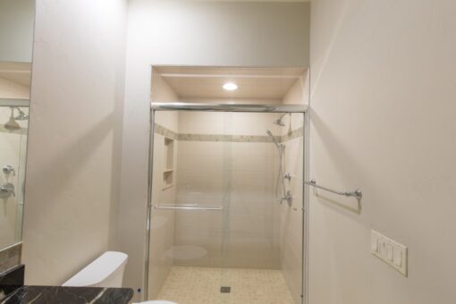 Callista glass shower with tile surround