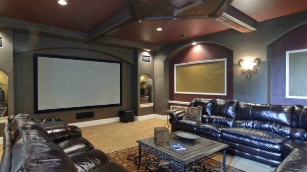 Buckingham lower-level home theater with leather seating