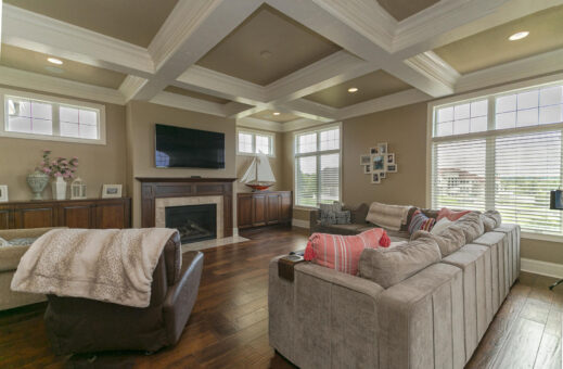Bradon hearth room with coffered ceiling and fireplace