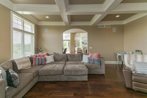 Bradon hearth room with coffered ceiling and sectional