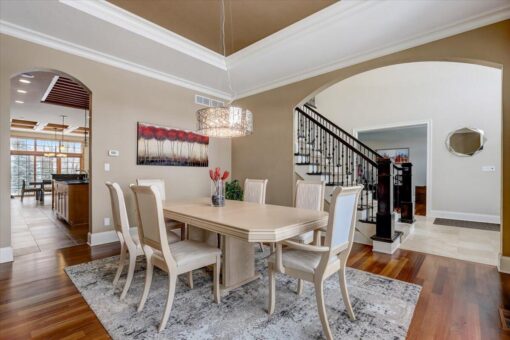 Ridgeview dining room with chandelier and hardwood floors