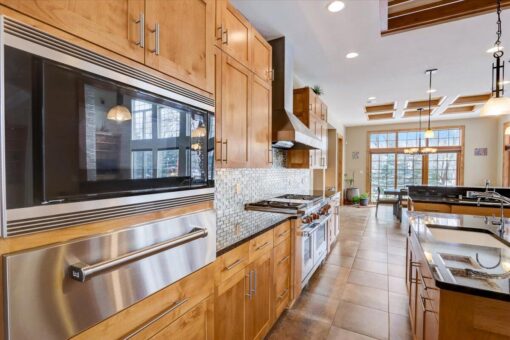 Ridgeview kitchen with built-in appliances and maple cabinetry