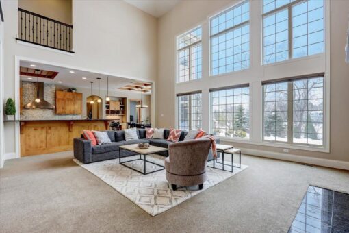 Ridgeview great room with window wall and balcony