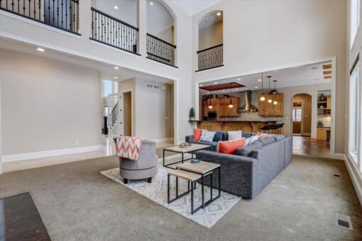 Ridgeview great room with balcony and view to the kitchen