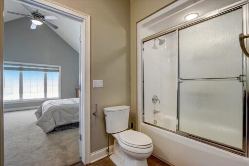 Ridgeview bathroom with glass tub enclosure