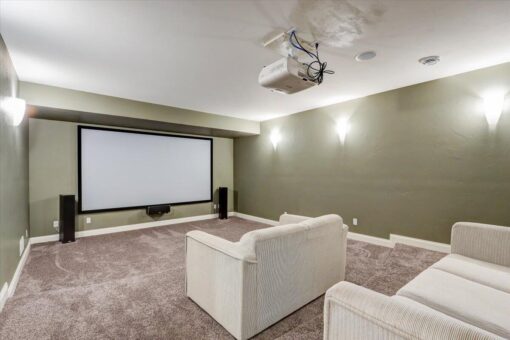 Ridgeview lower-level home theater with projector