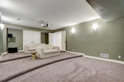 Ridgeview lower-level home theater with screen