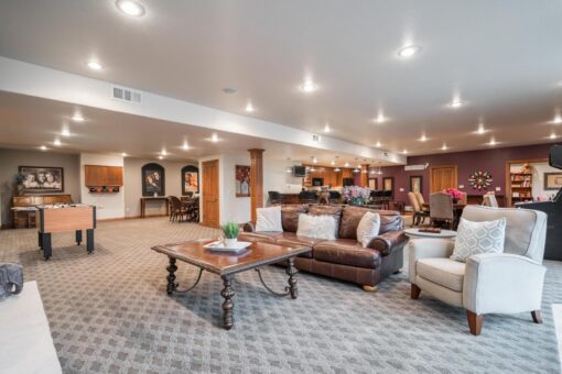 Brookridge lower-level family room with sitting area