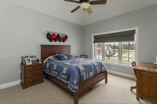 Bradon bedroom with vaulted ceiling