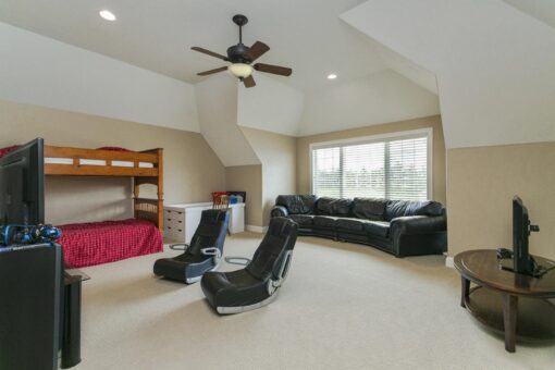 Bradon bonus room with bunk beds and lounge seating