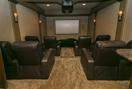 Bradon lower-level home theater with leather recliners