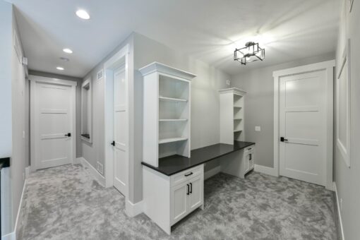 Hawks Ridge loft with built-in desk and cabinetry