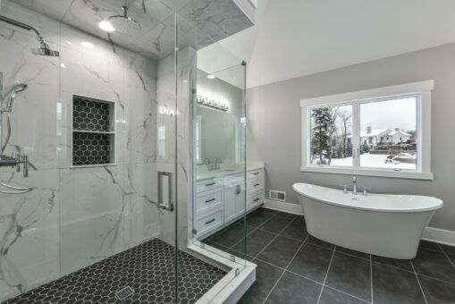 Hawks Ridge primary bath marble shower and freestanding tub