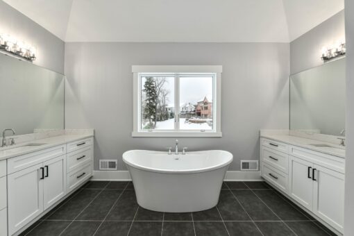 Hawks Ridge primary bath freestanding tub between double vanities