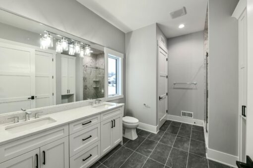 Hawks Ridge bathroom with white double vanity