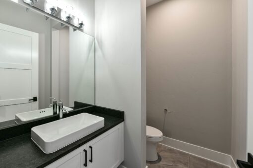 Hawks Ridge bathroom with vessel sink and black counter