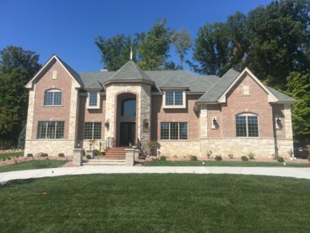 Rivendell front elevation with brick exterior and arched entry