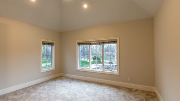 Davidson bedroom with large window and carpet