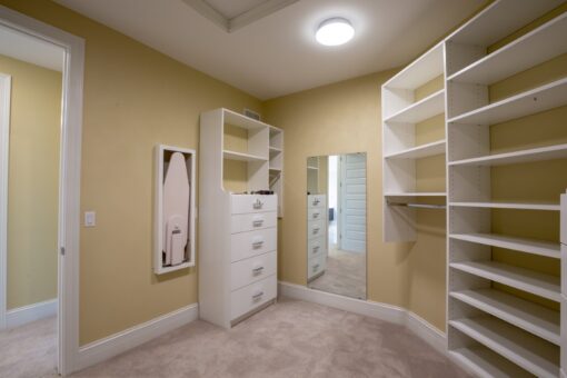 Ravenna walk-in closet with white shelving