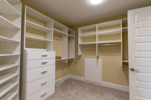 Ravenna walk-in closet with white built-ins