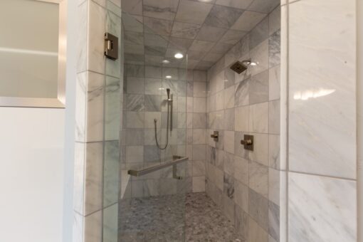 Ravenna marble walk-in shower with glass enclosure