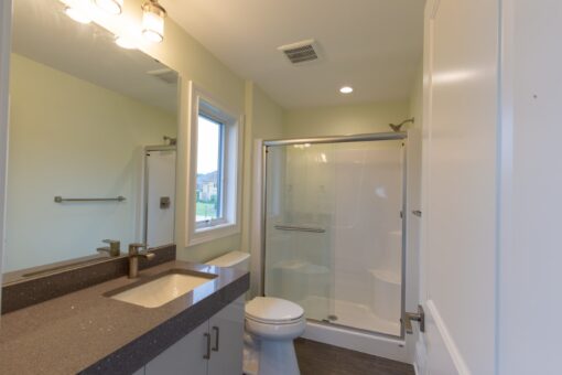 Ravenna bathroom with glass shower and window