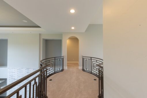 Ravenna loft with curved iron railing