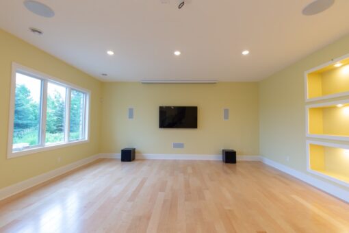 Ravenna lower-level family room with maple floors