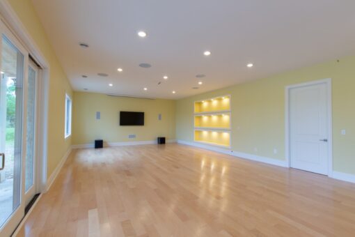 Ravenna lower-level family room with lit niches