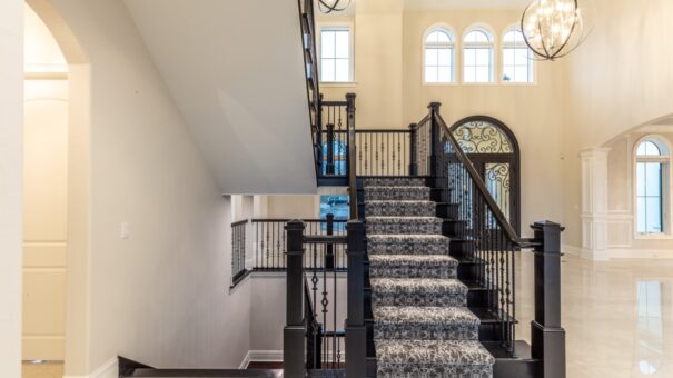 Davidson foyer staircase with patterned carpet runner