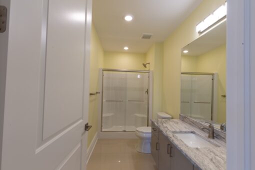 Ravenna lower-level bathroom with granite vanity